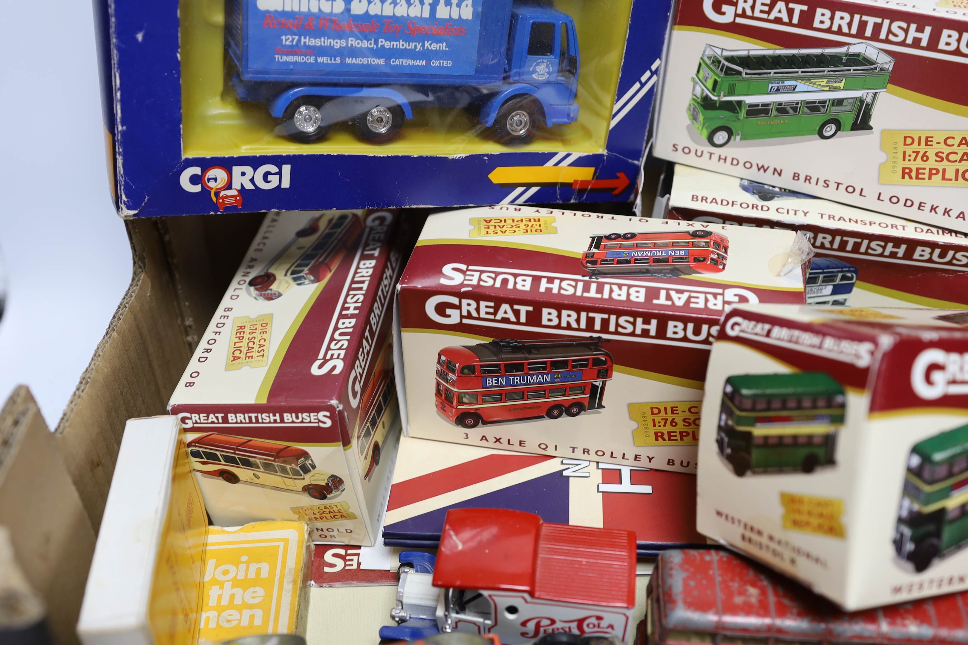 A quantity of boxed model cars, including Great British Buses, Corgi and Dinky